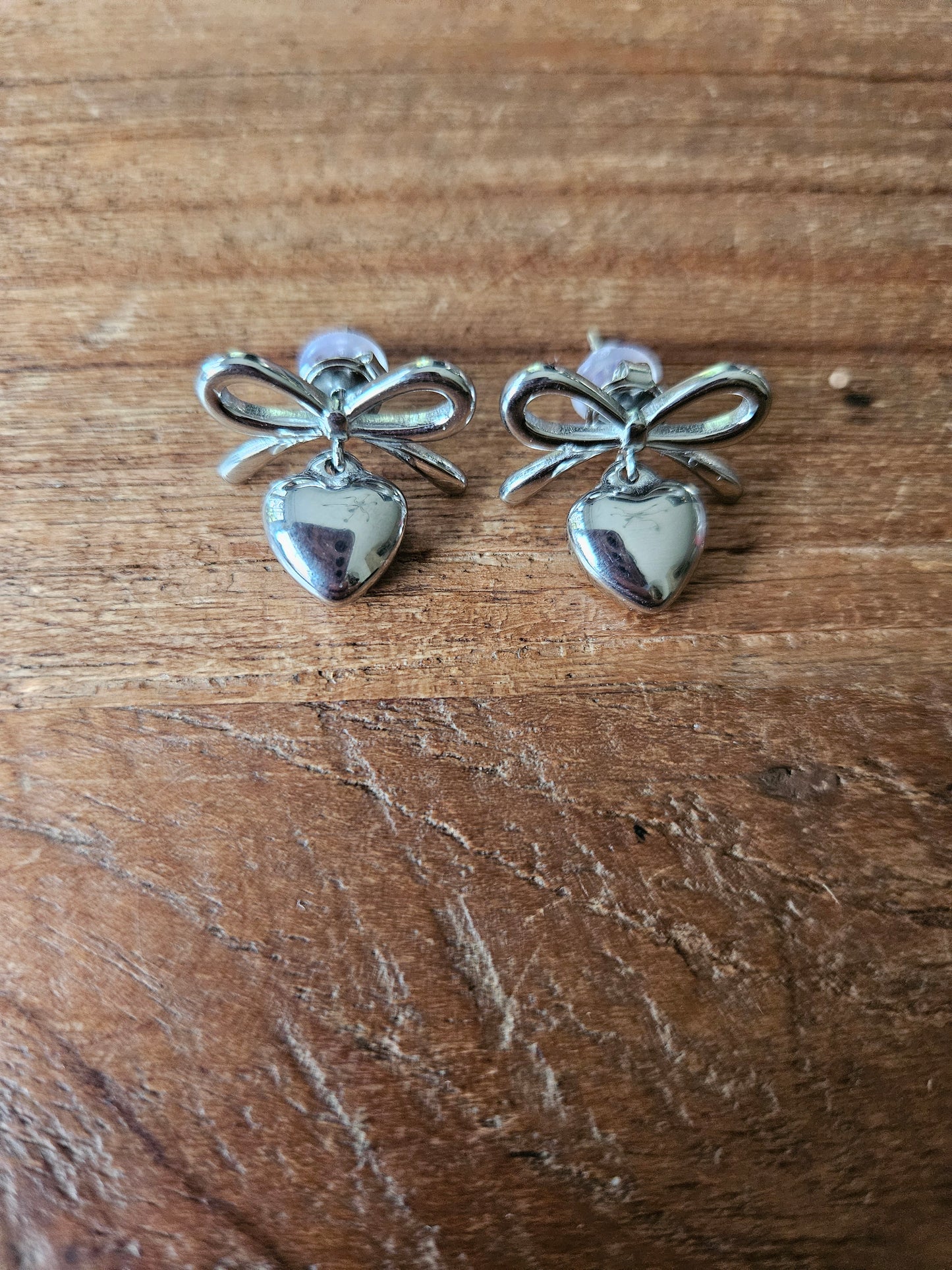Oorbellen strik hartje zilver